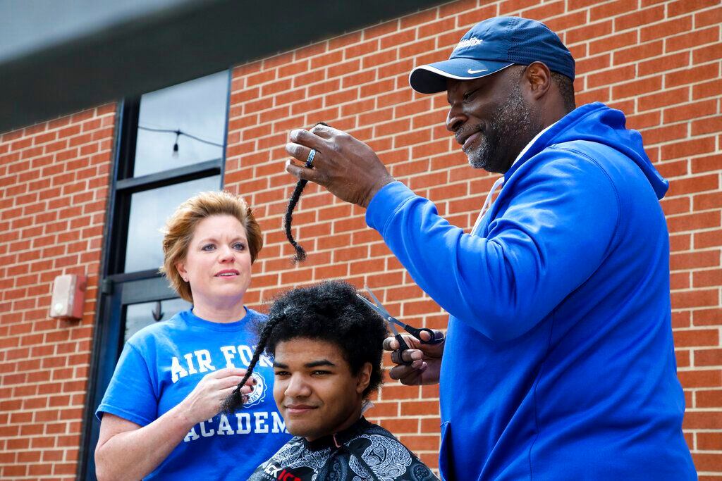 Kieran Moïse raised $38,000 by cutting off his 19-inch Afro after