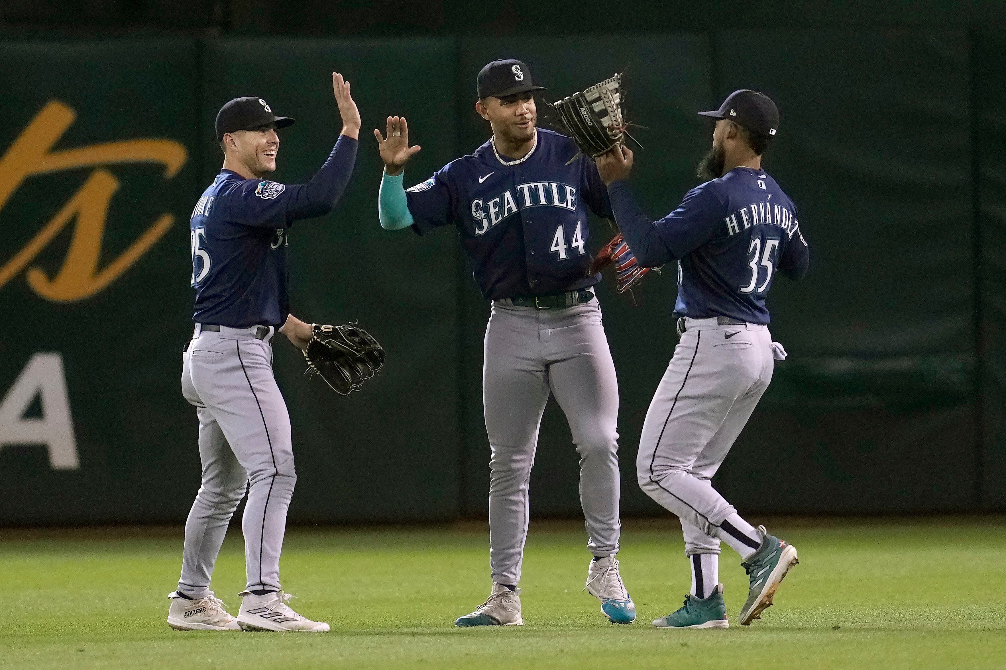 Woo wins homecoming as Mariners blank A's 5-0 to move closer in AL West and  tie for final wild card