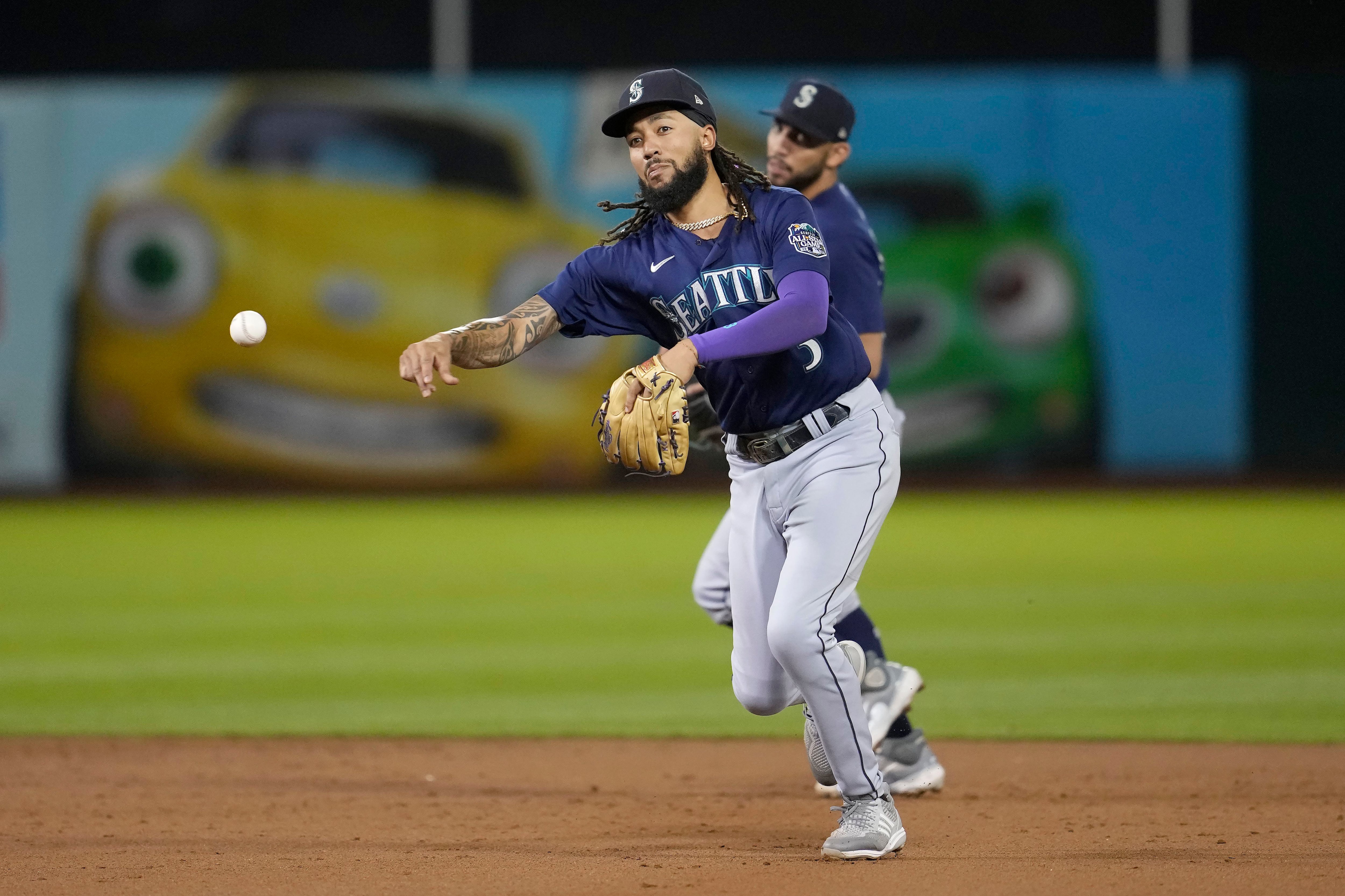 Woo wins homecoming as Mariners blank A's 5-0 to move closer in AL West and  tie for final wild card